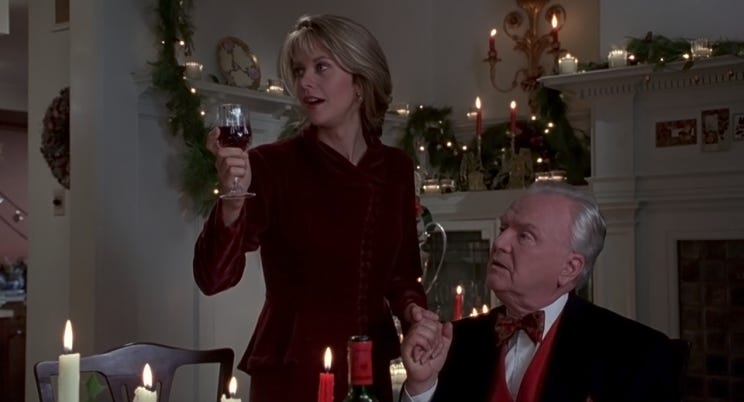 Still of Meg Ryan in Sleepless in Seattle, giving a toast during Christmas dinner.