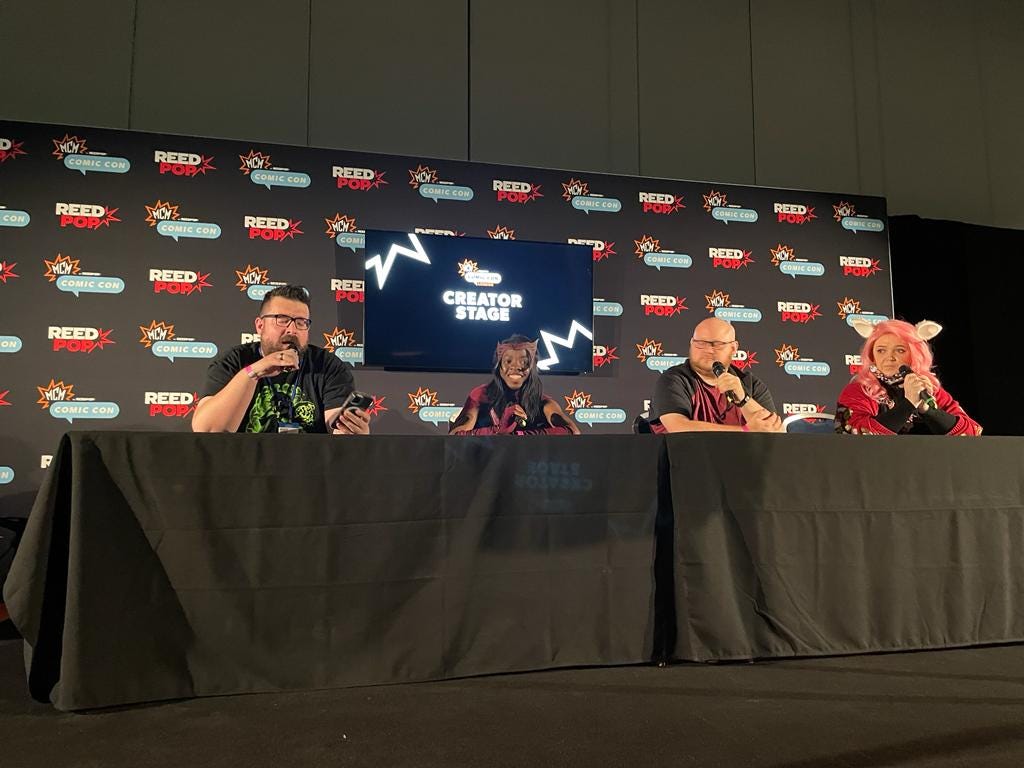 An image of myself and the other panelists on the creator stage at MCM Comic Con London