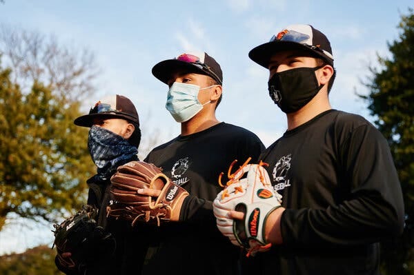Strangers brought masks, gloves and a desire for simple pleasure to the game of catch.