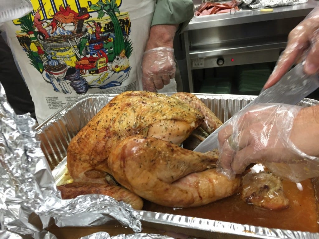 Salt Lake Rotary Club prepared a holiday feast for 250 people at the Lied Boys and Girls Club, courtesy of Teri Jensen