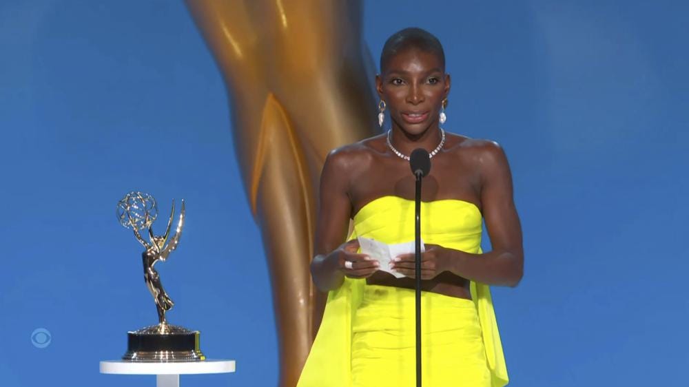 In this video grab issued Sunday, Sept. 19, 2021, by the Television Academy, Michaela Coel accepts the award for outstanding writing for a limited or anthology series or movie for "I May Destroy You" during the Primetime Emmy Awards. (Television Academy via AP)