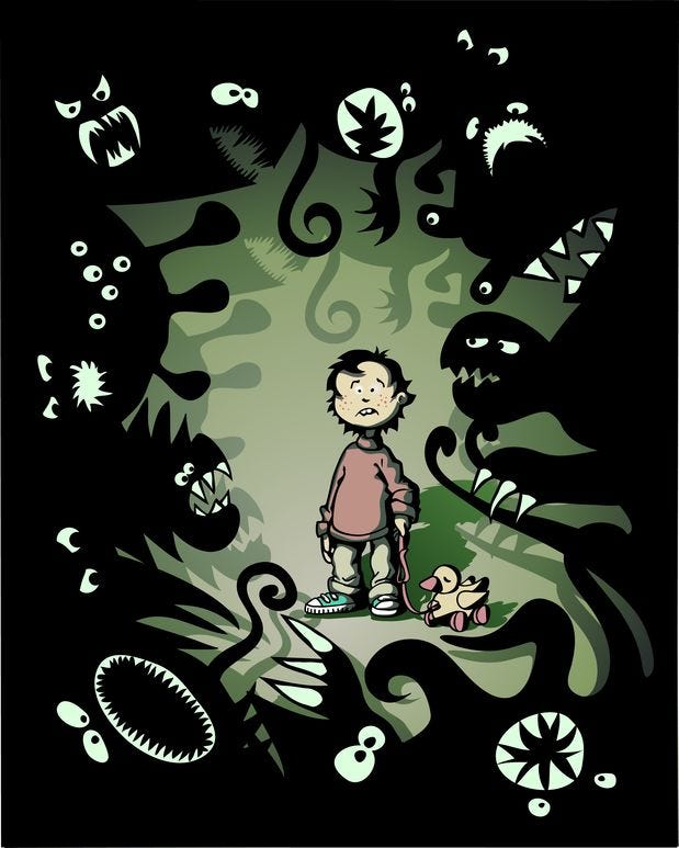 fearful little boy surrounded by fantasy monsters