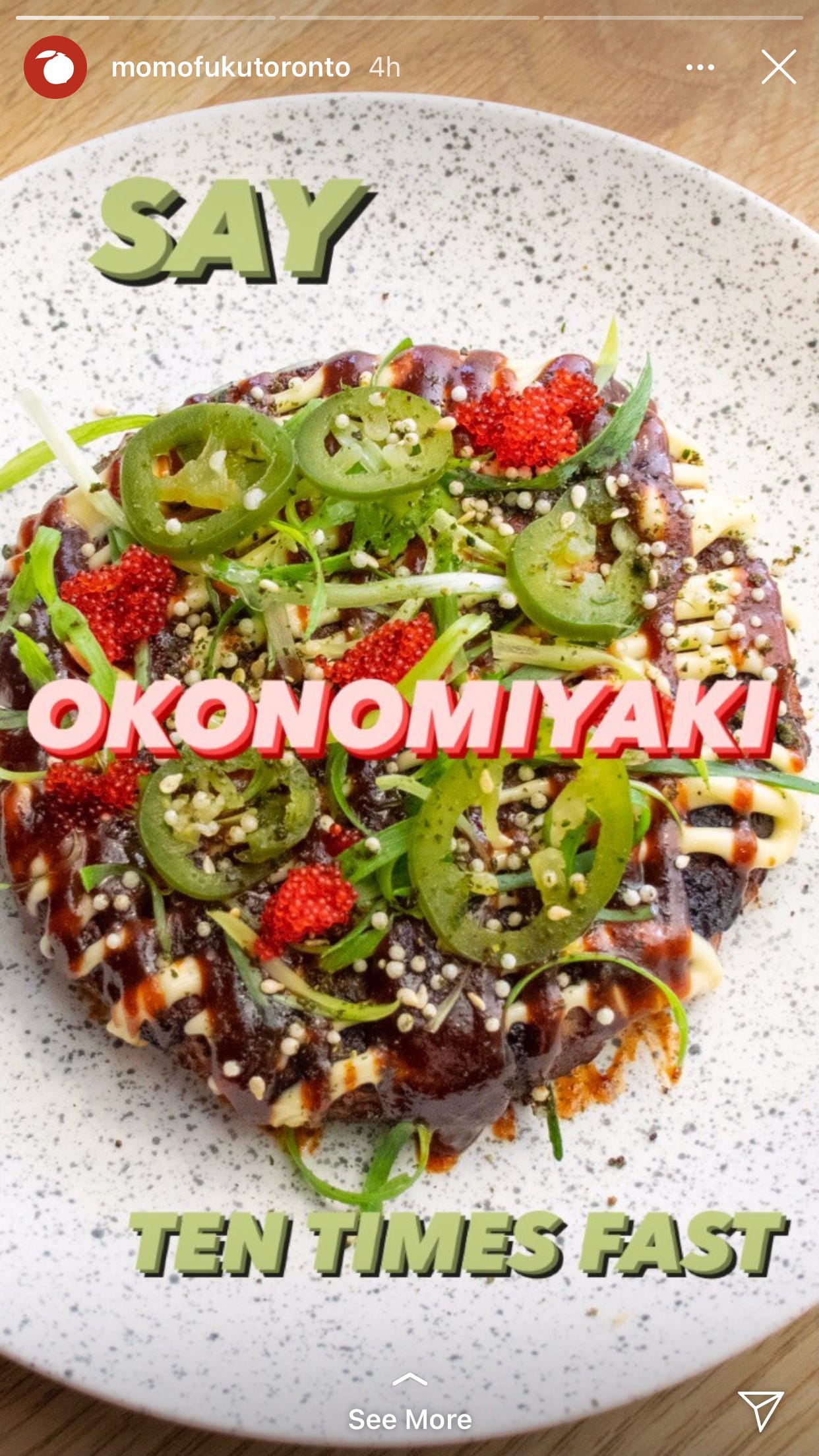  Screenshot of an Instagram story from Momofuku Toronto that reads, “Say okonomiyaki ten times fast”.