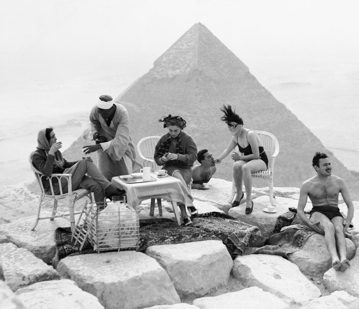 Tourists having tea on top of the Great Pyramid back in 1938
