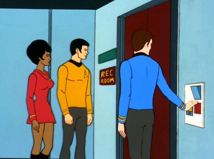 This image shows a cel from "The Practical Joker," the 19th episode of Star Trek: The Animated Series. From left to right, Nyota Uhura (voiced by Nichelle Nichols), Hikaru Sulu (voiced by George Takei), and Leonard McCoy (voiced by DeForest Kelley) stand outside the closed doors to the U.S.S. Enterprise's (NCC-1701's) Rec Room. A plaque bearing the name "Rec Room" is visible to the entrance doors' left side. McCoy's right hand touches a panel on the doors' right side. Uhura and Sulu wait for the doors to open. This image shows a cel from "The Practical Joker," the 19th episode of Star Trek: The Animated Series. From left to right, Nyota Uhura (voiced by Nichelle Nichols), Hikaru Sulu (voiced by George Takei), and Leonard McCoy (voiced by DeForest Kelley) stand outside the closed doors to the U.S.S. Enterprise's (NCC-1701's) Rec Room. A plaque bearing the name "Rec Room" is visible to the entrance doors' left side. McCoy's right hand touches a panel on the doors' right side. Uhura and Sulu wait for the doors to open.