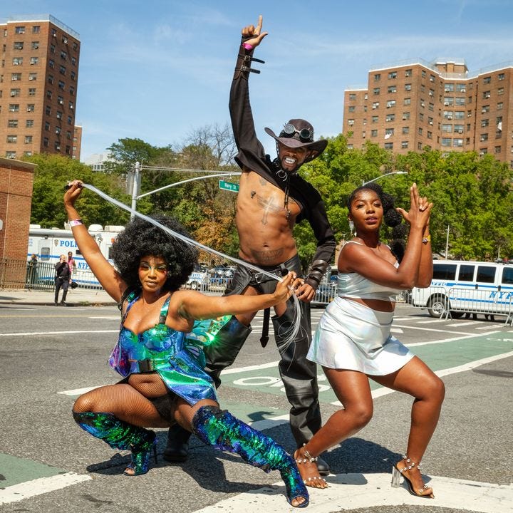 Friends Leah King, Anthony Grant and Shantel Thompson strike a pose ahead of Afropunk Brooklyn 2022.