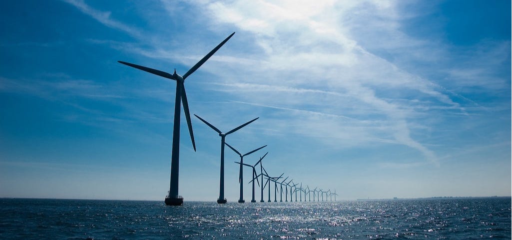 Windmills in article Alexander Verbeek on optimism for climate change in The Planet newsletter photo credits in notes