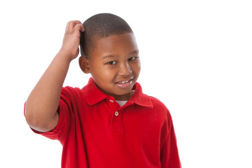 Real People African American Boy Scratching Head Thinking Confused Stock  Photo - Download Image Now - iStock