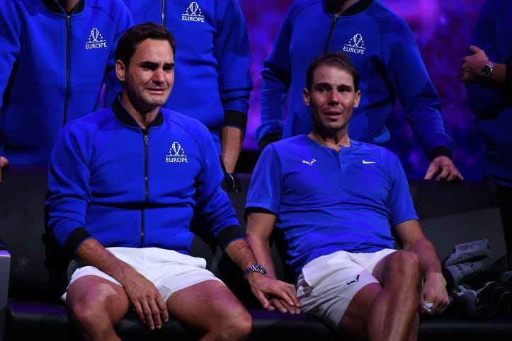 Roger Federer and Rafael Nadal held hands crying after playing doubles together one last time.