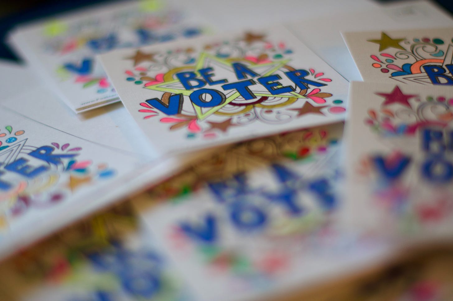 Pile of "Be a Voter" stickers