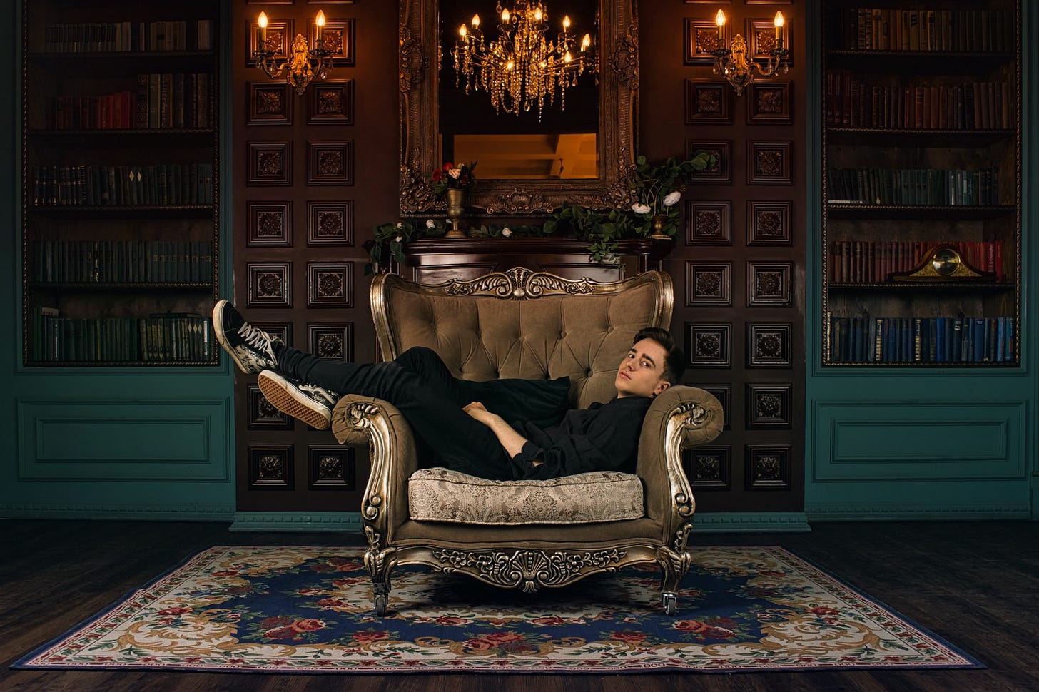 Man lying down in a palatial antiquely-designed room