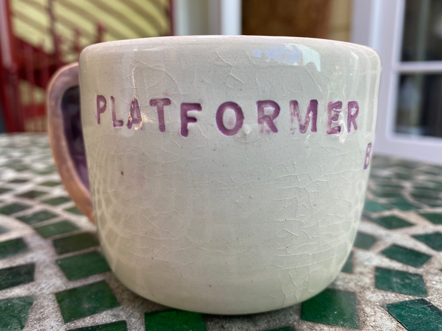 Photo of the official Platformer coffe mug, handcrafted by Helen Havlak
