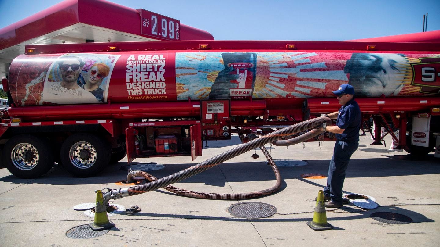 A tanker driver delivers 9.000 gallons of fuel to a gas station in Raleigh, N.C., Thursday.