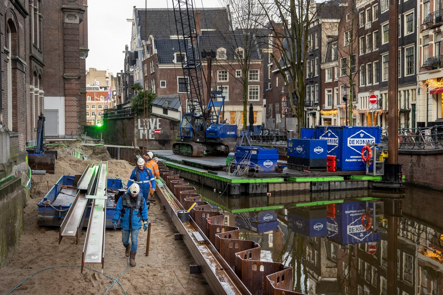 Construction workers worked to rebuild the crumbling canal wall in the Grimburgwal district of Amsterdam in January.
