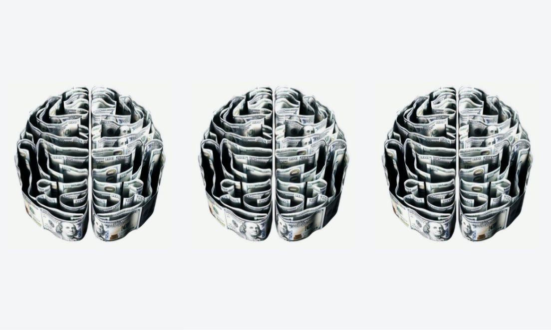 Imagem mostra três cérebros "desenhados" com notas de dólares.
