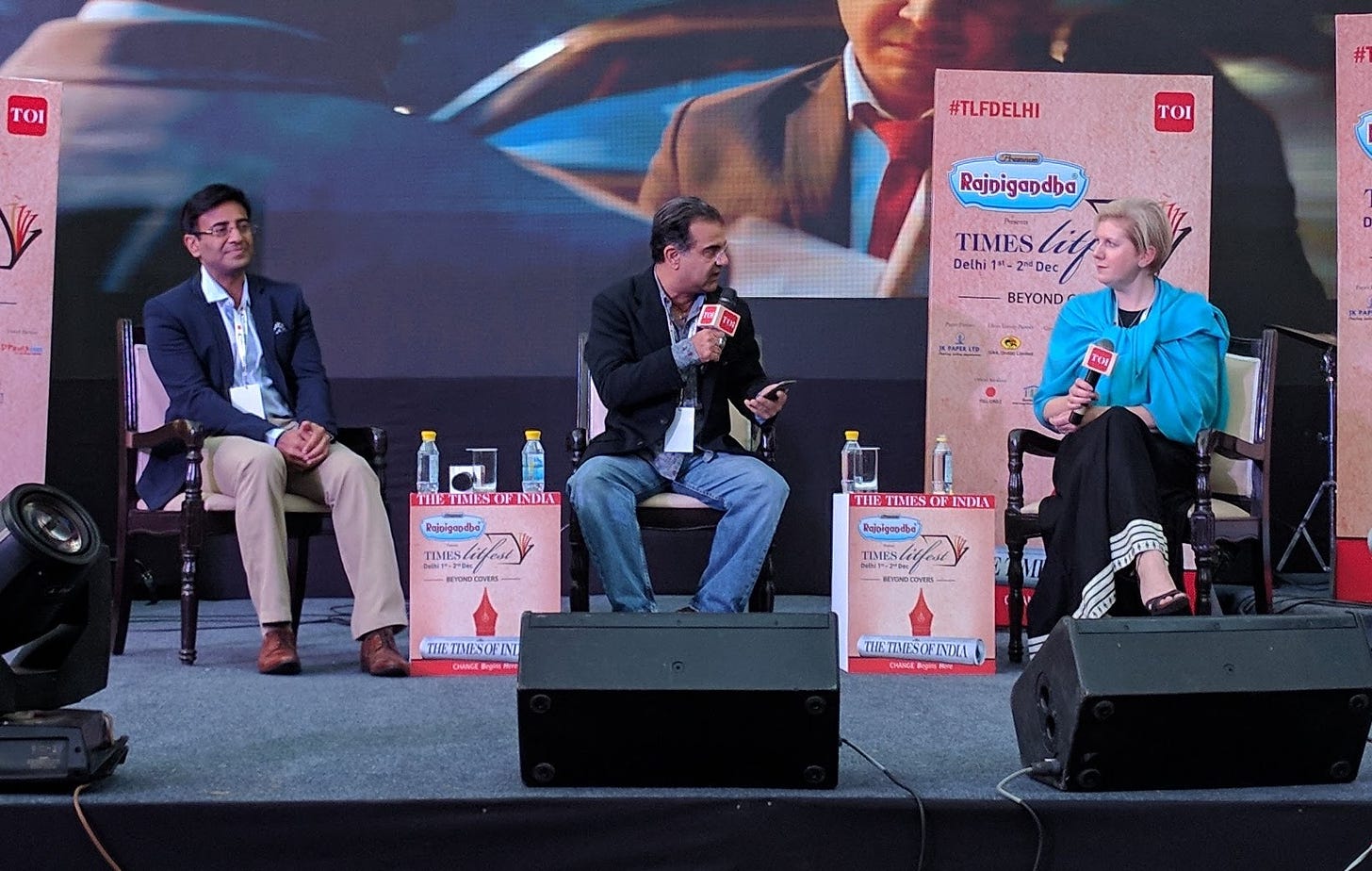 https://upload.wikimedia.org/wikipedia/commons/d/d9/Clare_Mackintosh_at_Times_LitFest_in_New_Delhi_with_IPS_officer_Amit_Lodha_on_left.jpg