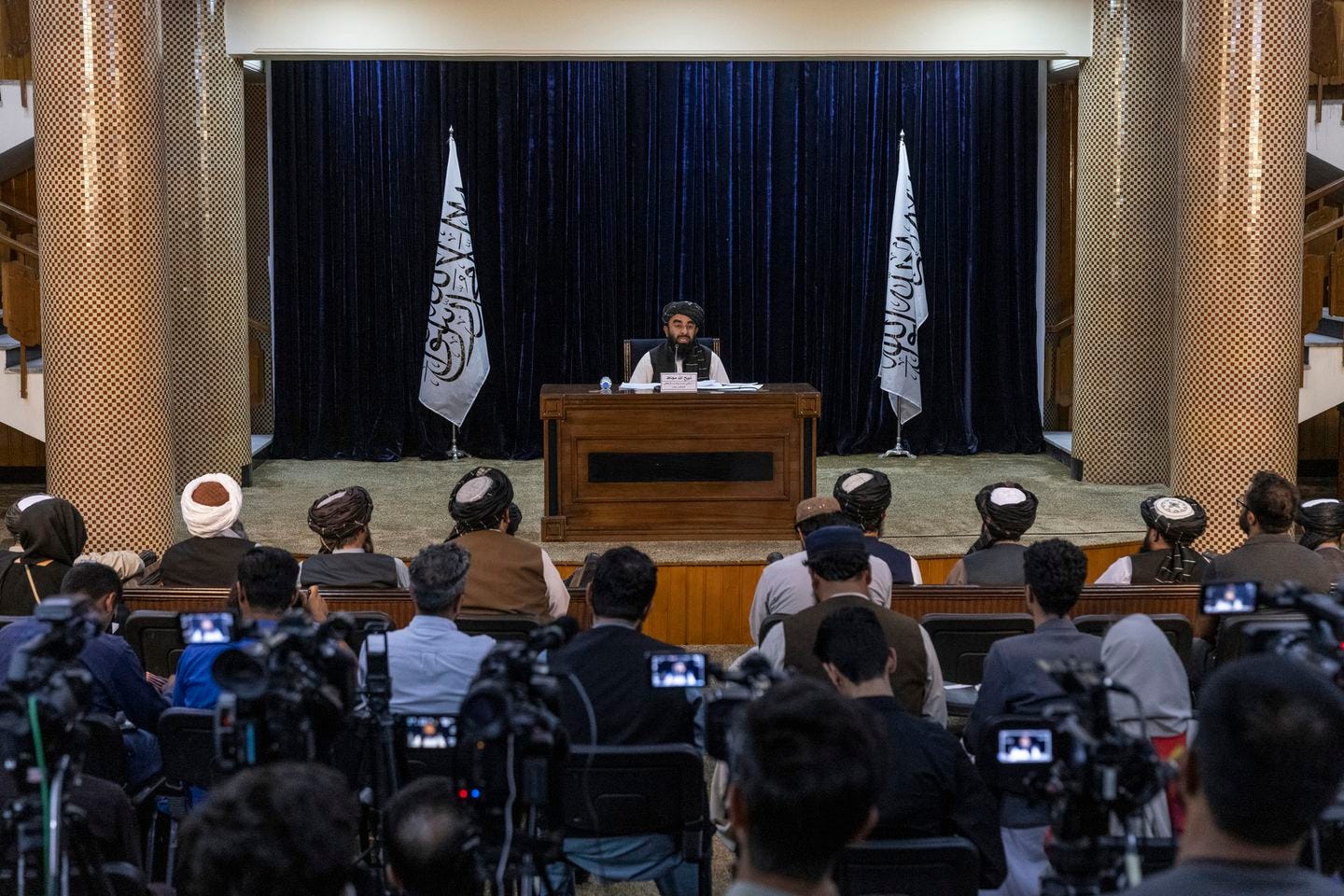 Zabihullah Mujahid, spokesman for the Taliban, conducted a news conference to announce an acting Cabinet for the new Taliban government in Kabul on Tuesday.