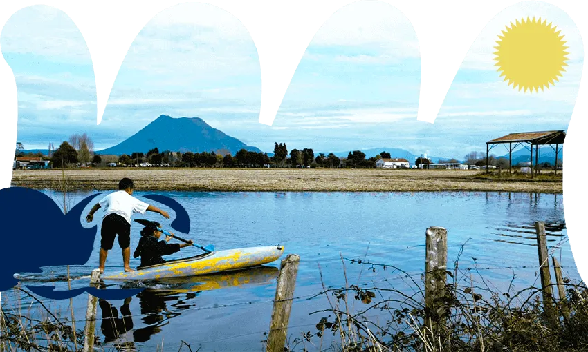 Kids navigate heavy flooding in Edgecumbe, 2004 (Photo: Michael Bradley / Getty Images; additional design by Tina Tiller) 
