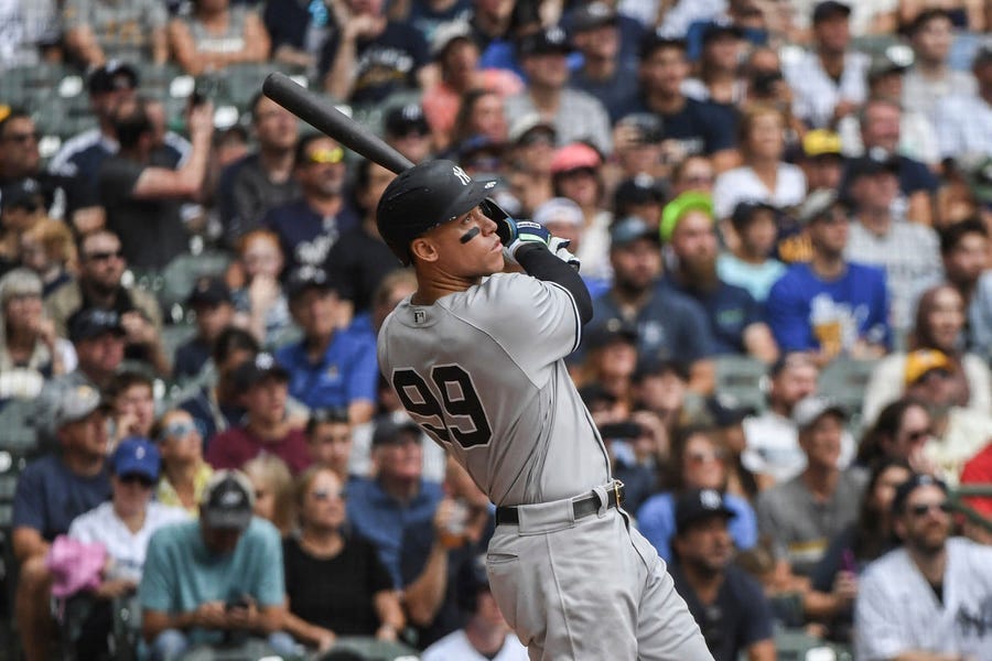 New York Yankees' Aaron Judge hits his fifty eighth homerun during the third inning of a baseball game against the Milwaukee Brewers Sunday, Sept. 18, 2022, in Milwaukee. (AP Photo/Kenny Yoo)