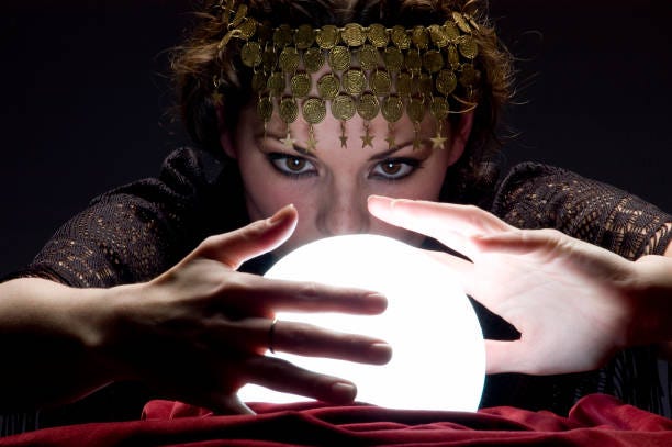 fortune teller with glowing crystal ball  gypsy crystal ball stock pictures, royalty-free photos & images