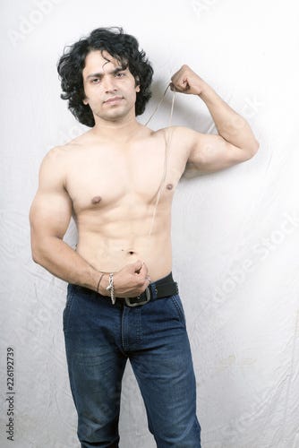 indian brahmin bodybuilder rising his janeu Stock Photo | Adobe Stock