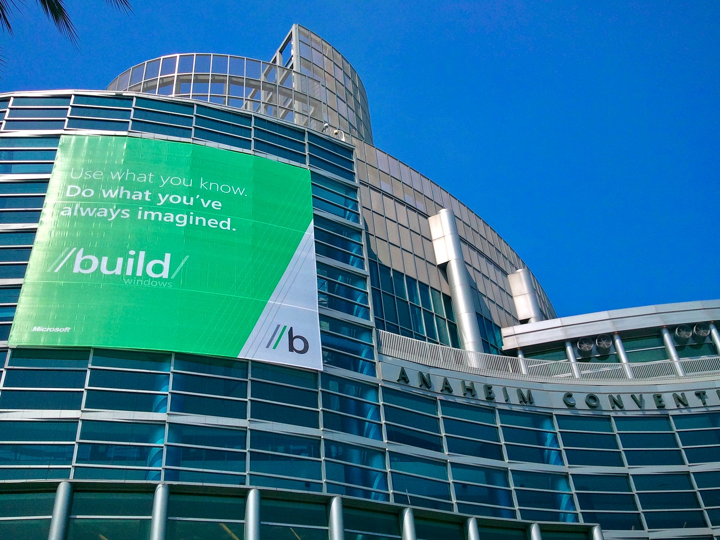 Photo of the front of the convention center. Sign says "Use what you know. Do what you've always imagined. //build