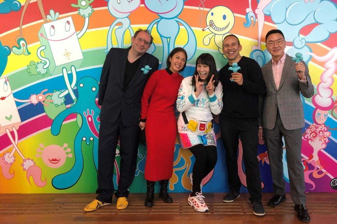 From left: Tobias Berger, head of art at Tai Kwun Contemporary, the venue for “Myth Makers - Spectrosynthesis III”, an art exhibition focused on LGBTQ+ perspectives, Chantal Wong, curator, artist Maru Yacco, who made the mural in the background, Inti Guerrero, curator, and Patrick Sun, founder of Sunpride Foundation, which backed the exhibition. Photo: Enid Tsui
