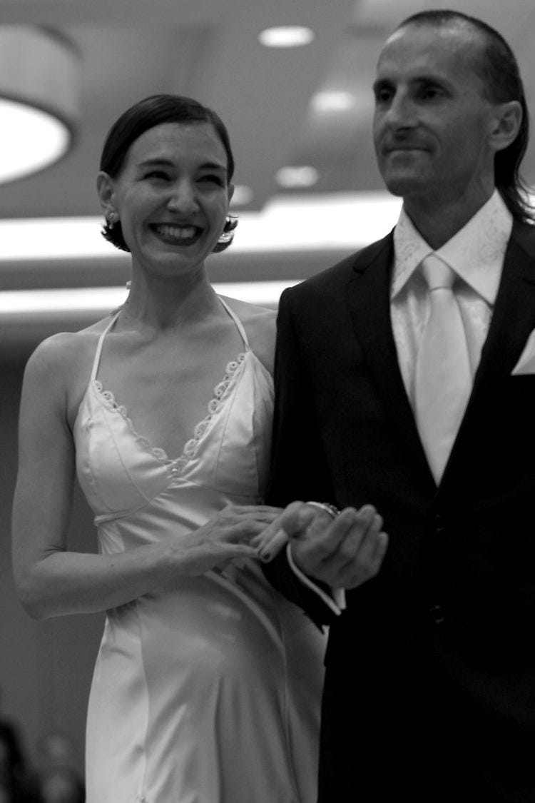 A smiling couple in black and white