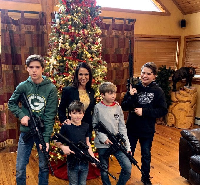 Boebert draws backlash for family Christmas photo of kids posing with guns  - ABC News