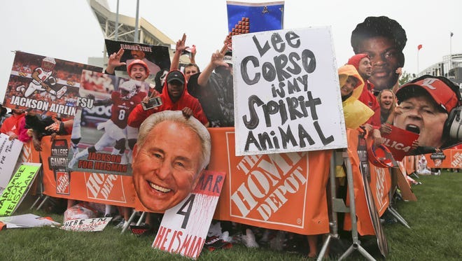 Fans brought signs and enthusiasm behind the ESPN "College GameDay" set outside Papa John's Cardinal Stadium last year.