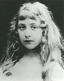 Black-and-white portrait photograph of Christie as a girl