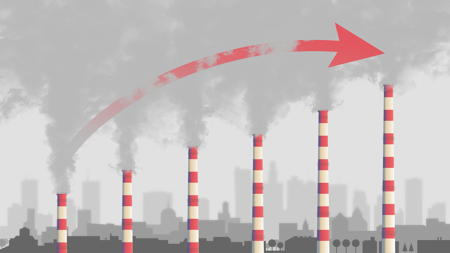 carbon emissions factories with red arrow