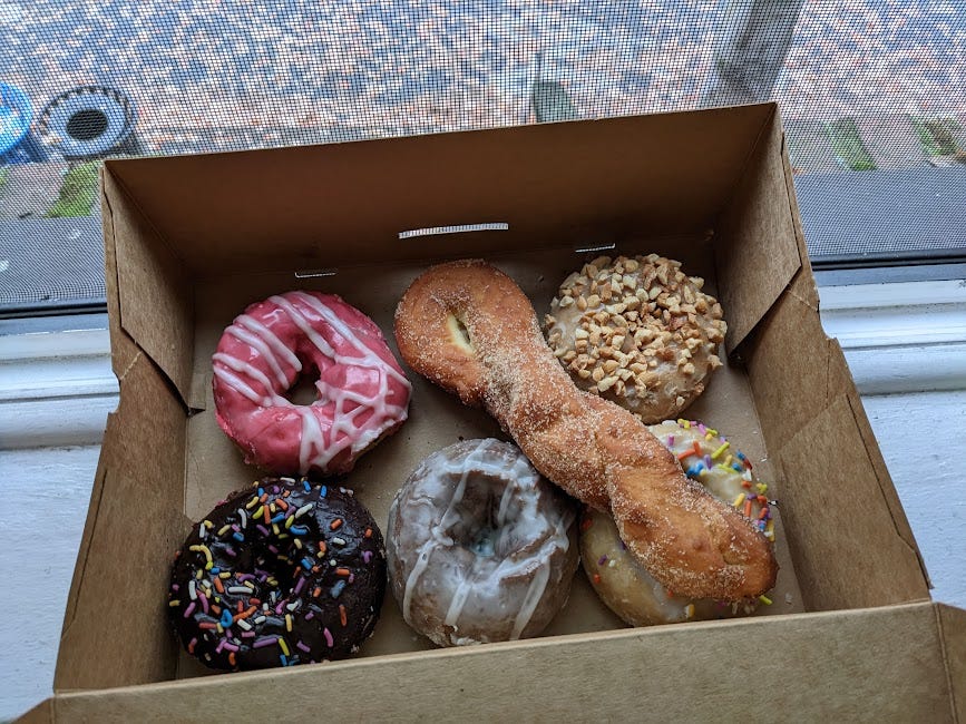 box of colorful doughnuts
