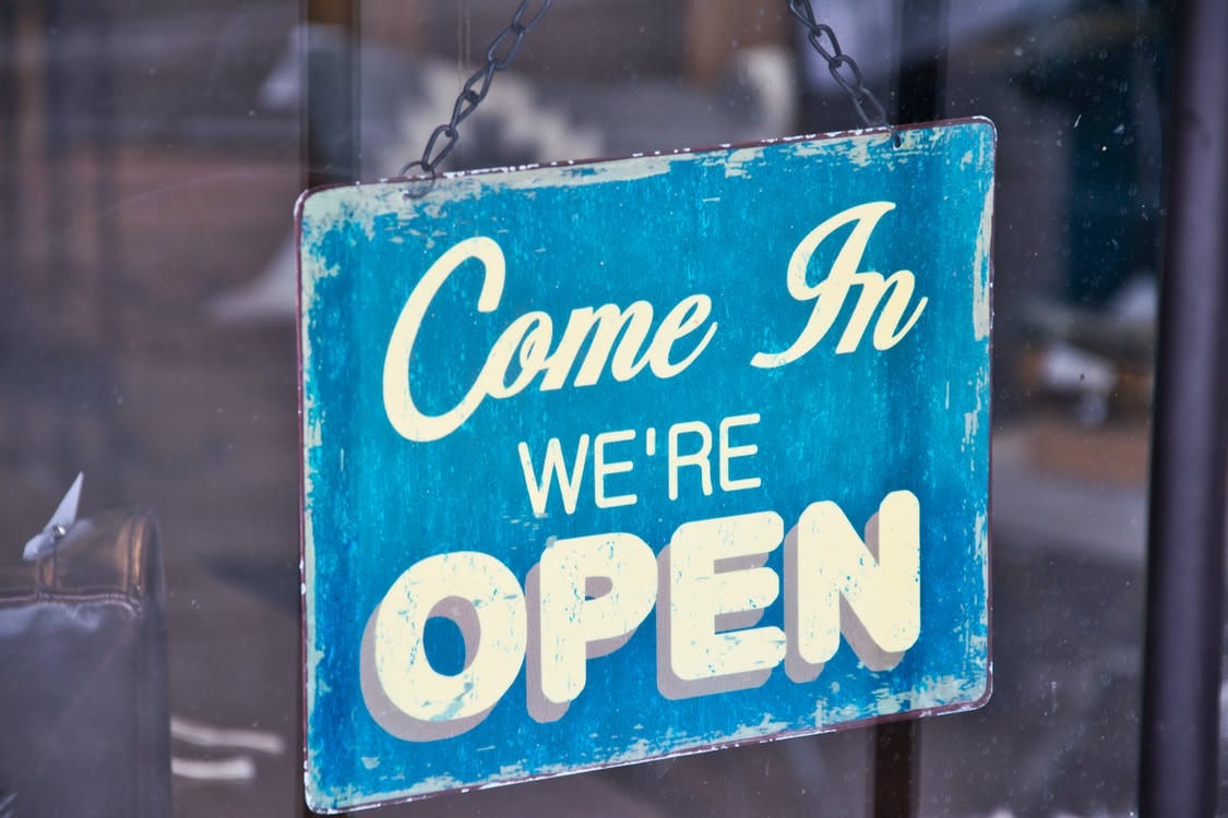 Blue and White Come in We're Open Signboard