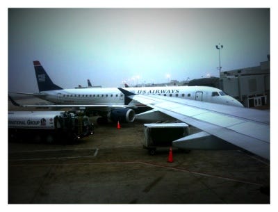 Joe's on an airplane.