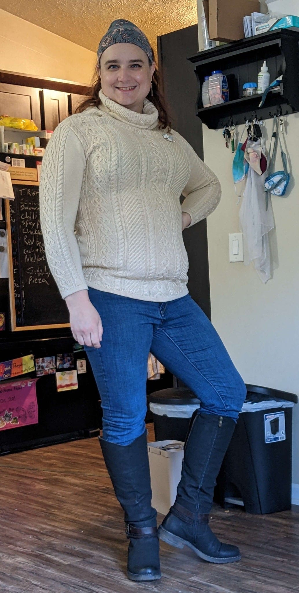 A picture of me, wearing a white sweater. My breasts do not look particularly large.