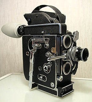 A 16 mm spring-wound Bolex camera.