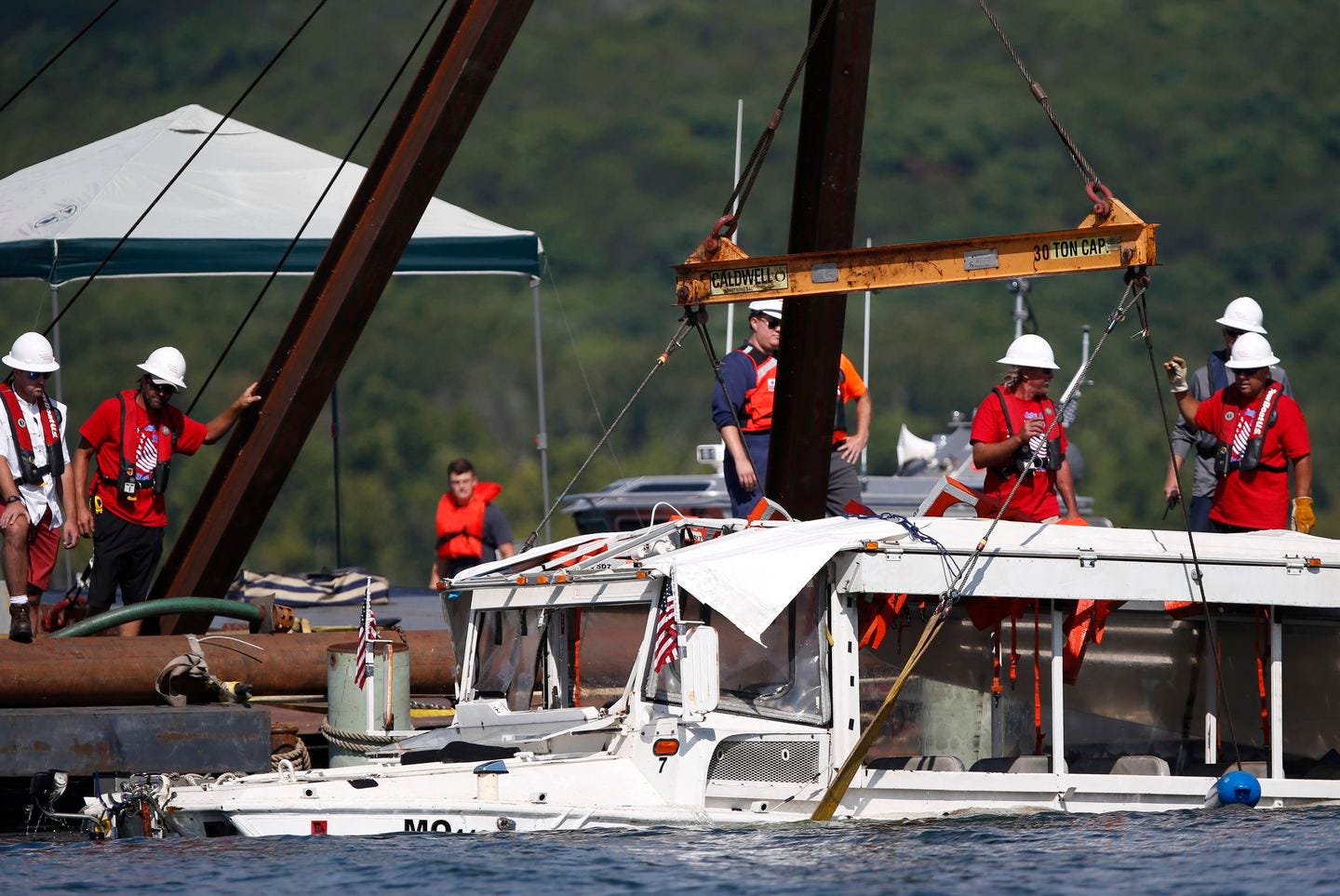 A duck boat that sank in Table Rock Lake in Branson, Mo., was raised after it went down the evening of July 19 after a thunderstorm generated near-hurricane strength winds, killing 17 people.