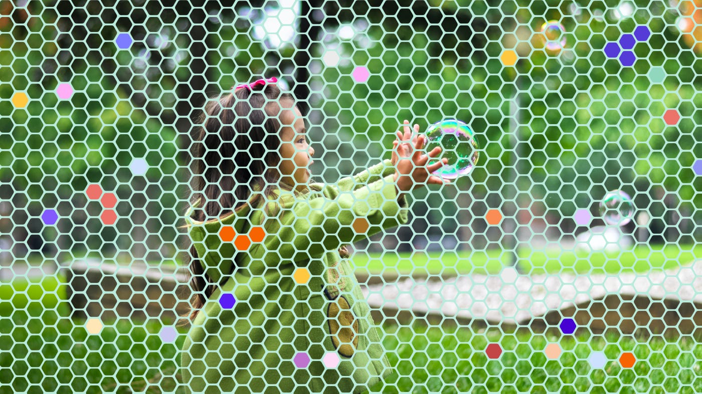 A photo illustration: a small girl with a soap bubble. Many small hexagons, some filled with color, cover the screen.