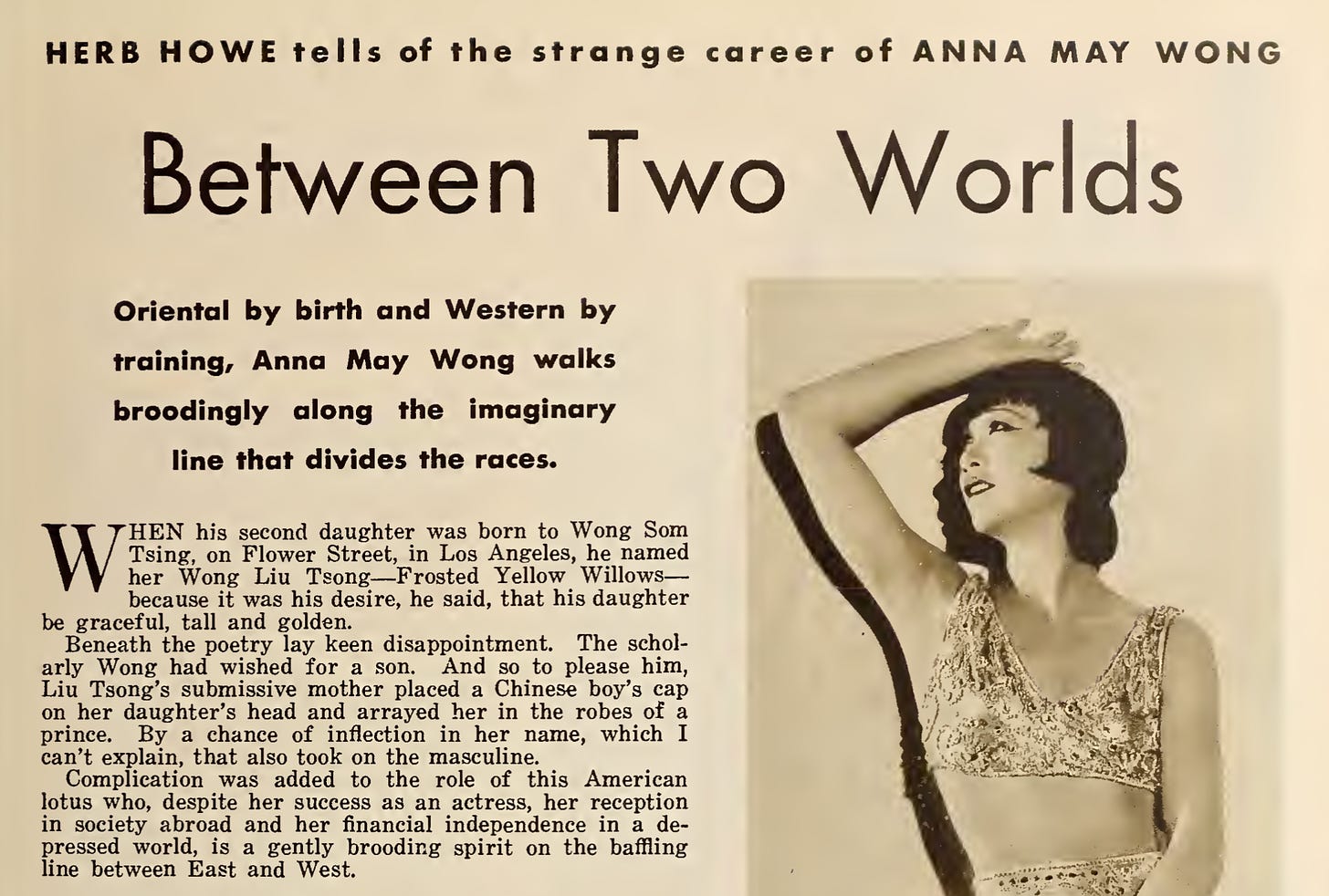 clipping of an article on Anna May Wong titled "Between Two Worlds"