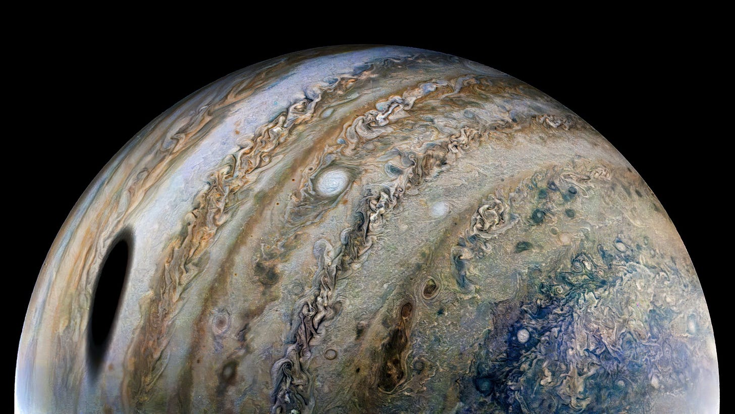 Figure 1. Citizen scientist Thomas Thomopoulos created this enhanced-color image using raw data from the JunoCam instrument. At the time the raw image was taken, the Juno spacecraft was about 44,000 miles (71,000 kilometers) above Jupiter’s cloud tops, at a latitude of about 55 degrees south, and 15 times closer than Ganymede, which orbits about 666,000 miles (1.1 million kilometers) away from Jupiter. Credit: NASA/JPL-Caltech/SwRI/MSSS, Image processing by Thomas Thomopoulos © CC BY