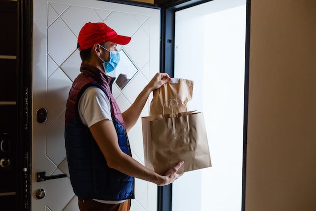 Gig delivery worker Angelov Adobe Stock