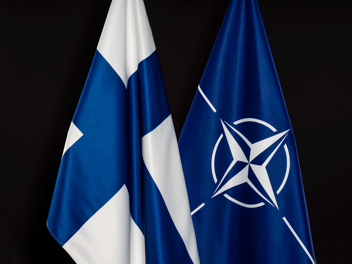 Finland and NATO flags (Image: Twitter/@NATOpress)