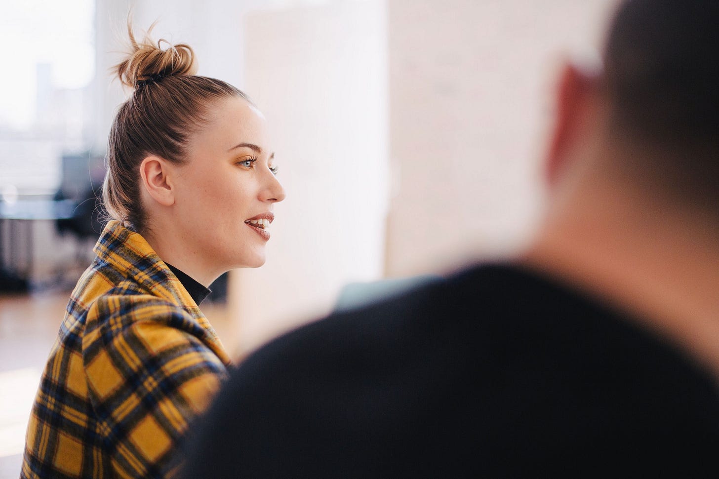 image of a woman and man in a brainstorming meeting