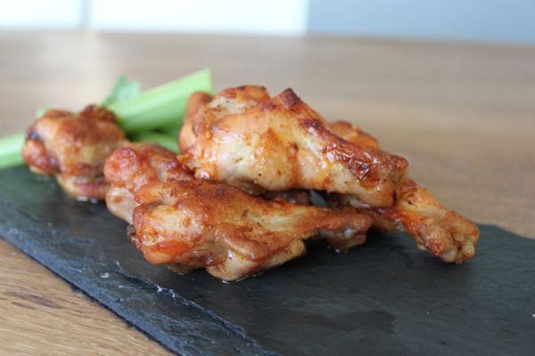 Spicy Buffalo Chicken Wings are a perfect snack for the football game or tailgate