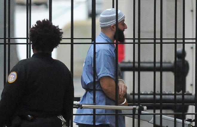 In this 2016 file photo, Adnan Syed enters Courthouse East in Baltimore prior to a hearing that was meant to determine whether Syed's conviction will be overturned and the case retried.