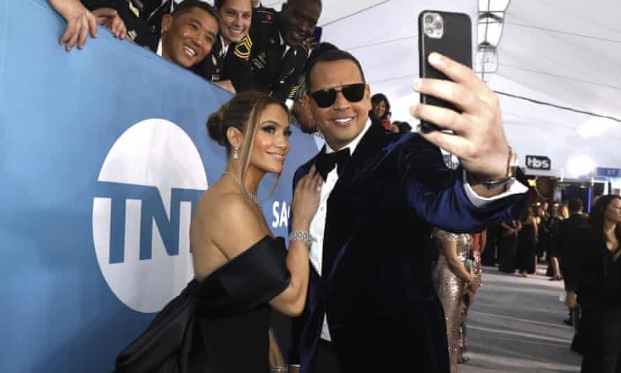 Jennifer Lopez and Alex Rodriguez take a selfie as they arrive at the 26th annual Screen Actors Guild Awards in Los Angeles, California on 19 January 2020.