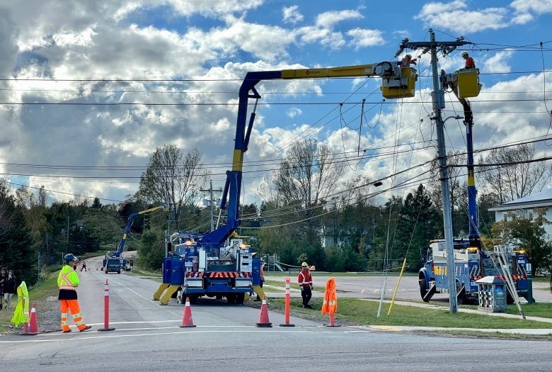 Power crews in Charlottetown pictured on Kirkdale Road 