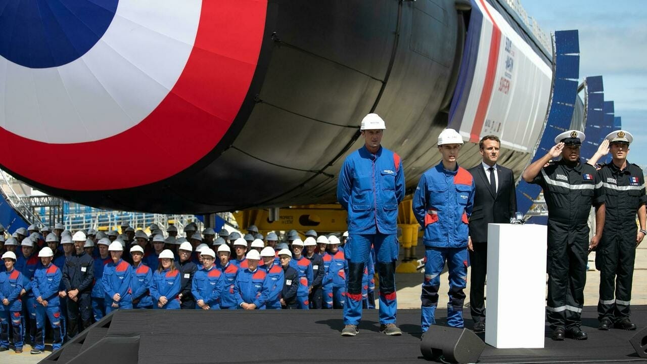 French President Emmanuel Macron attends the official launch ceremony of the new French nuclear submarine "Suffren" in Cherbourg, northwestern France, 12 July 2019.