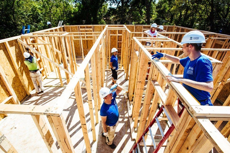 Volunteers on a Habitat for Humanity build